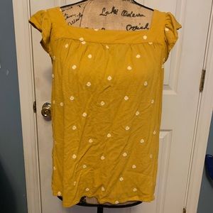 Honey mustard color shirt with white flowers